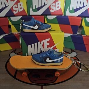 Nike SB pair of mini sneakers Keychain.